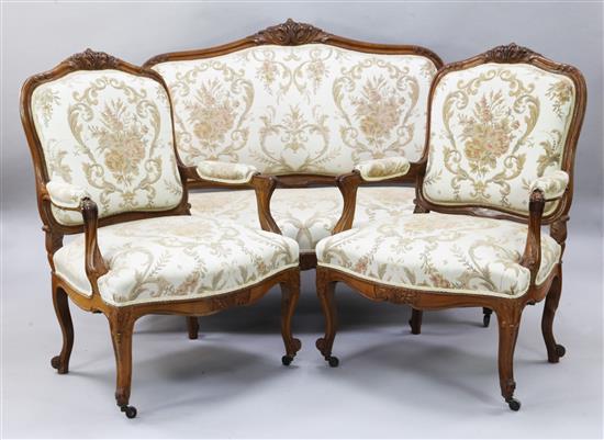 A 19th century French three piece walnut salon suite,